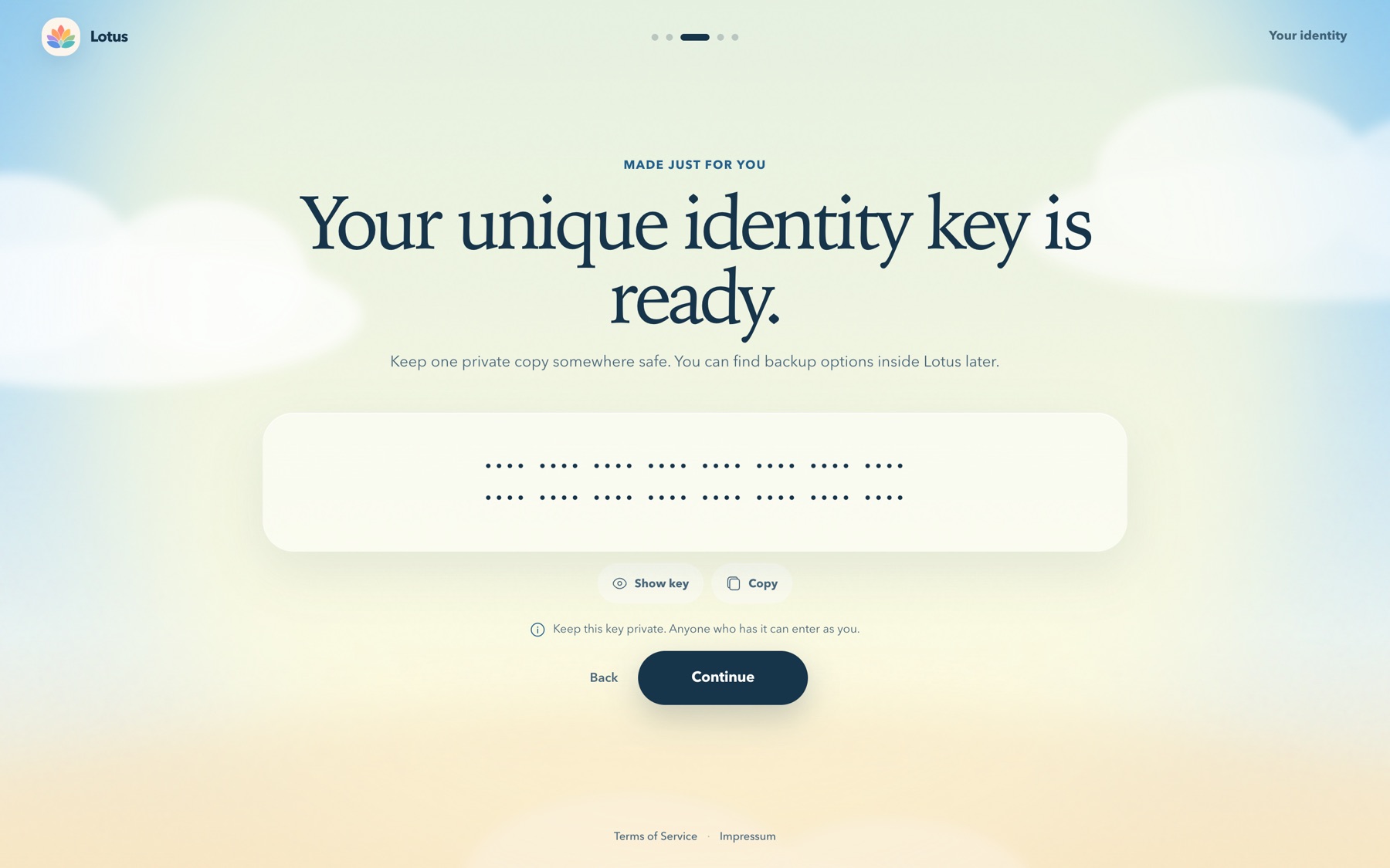 An onboarding screen reading Your unique identity key is ready, with the key masked for privacy.