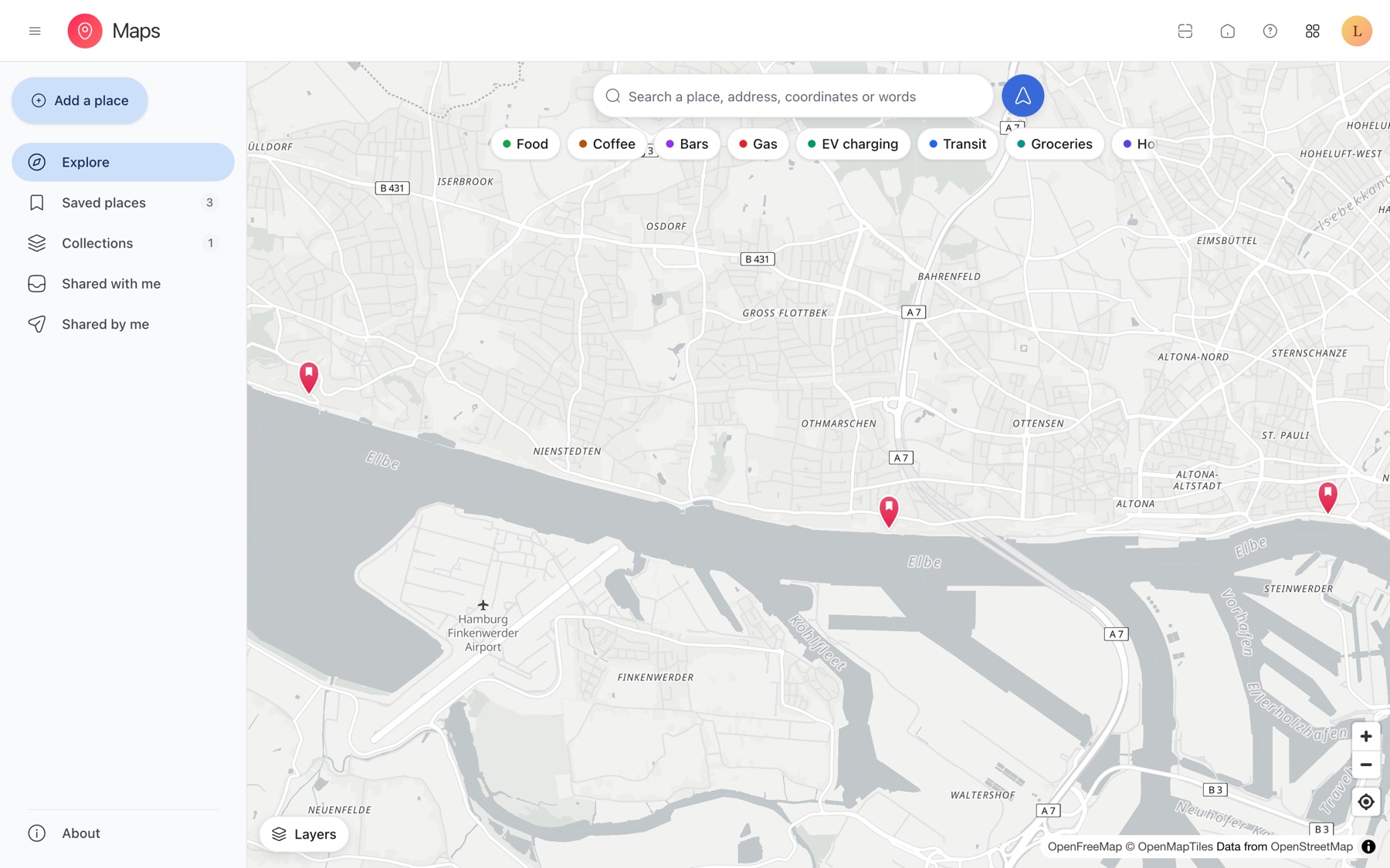 Lotus Maps showing Hamburg with three saved pins along the Elbe and category chips for sorting them.